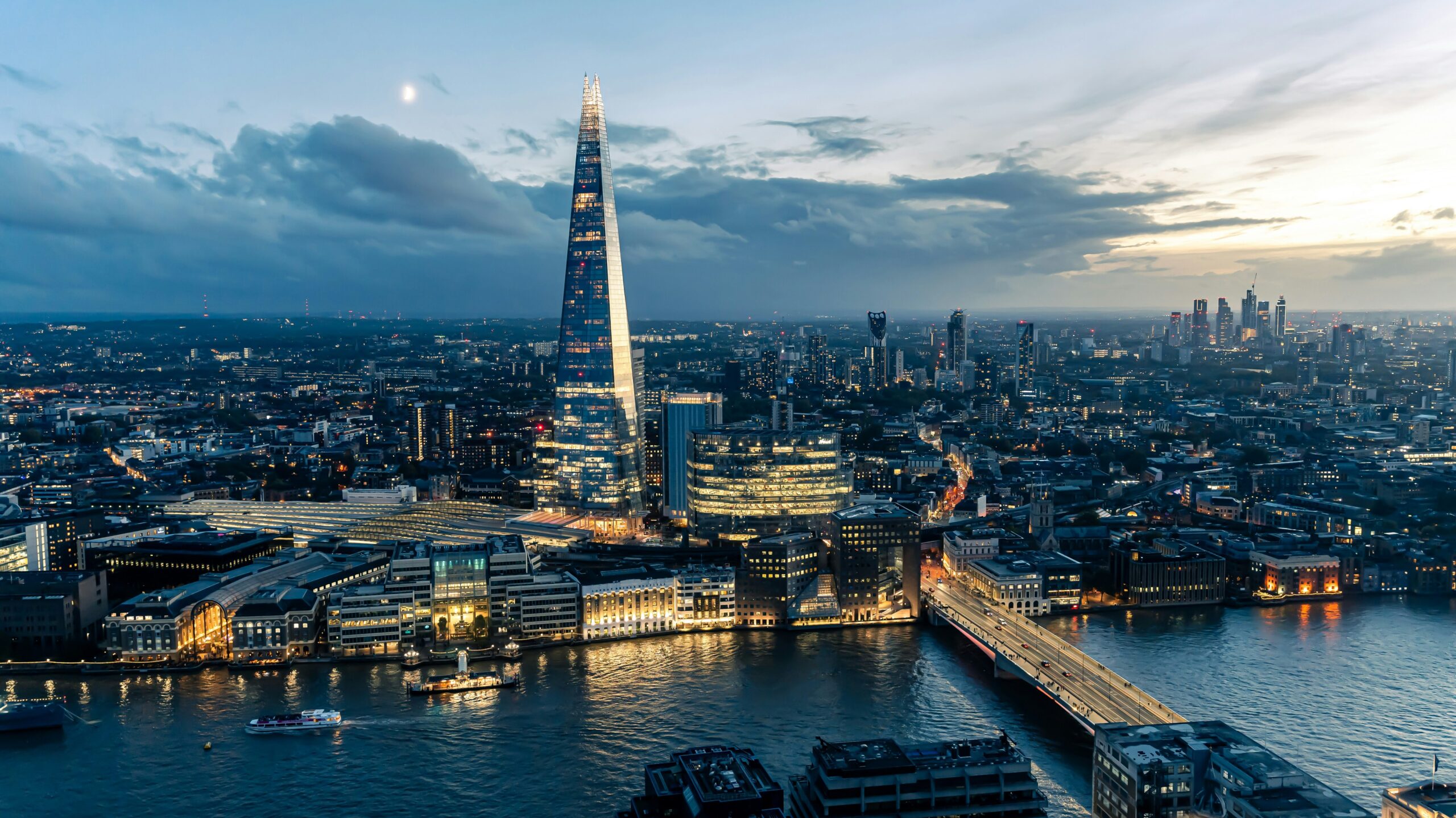 Evening London | Krista the Explorer View of London skyline at night with Shard in background.