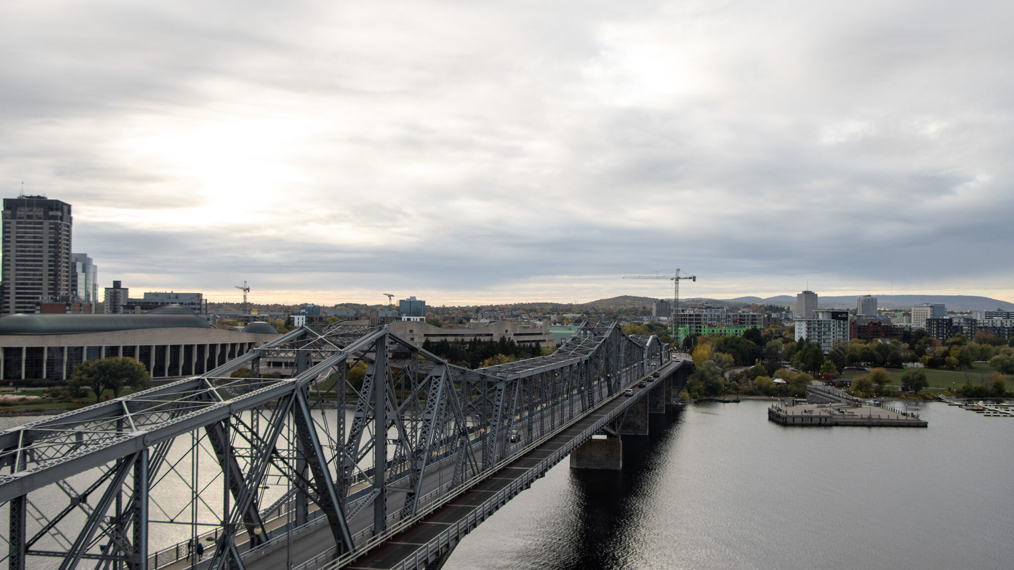 Alexandra Bridge Ottawa | Krista the Explorer Large steel bridge crossing over river.