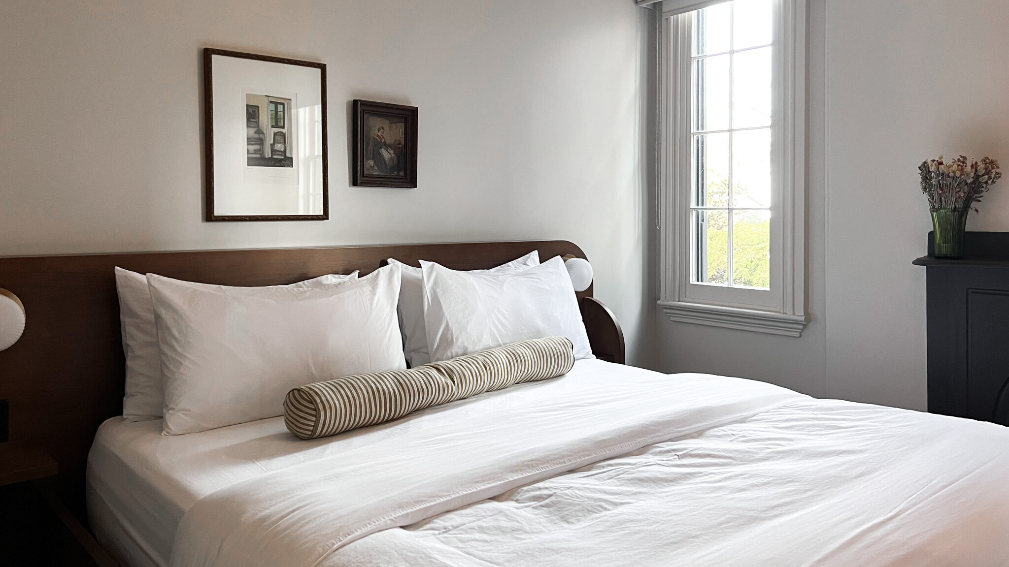 Belvedere Hotel Kingston | Krista the Explorer King size bed with plush pillows in hotel.