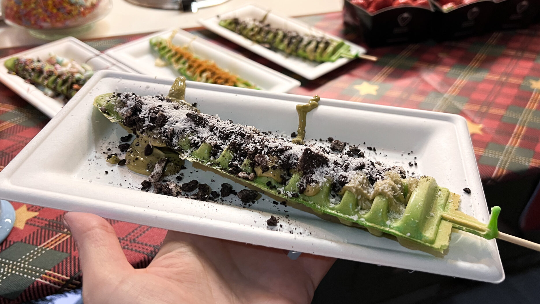 Green waffle in the shape of a Christmas tree.