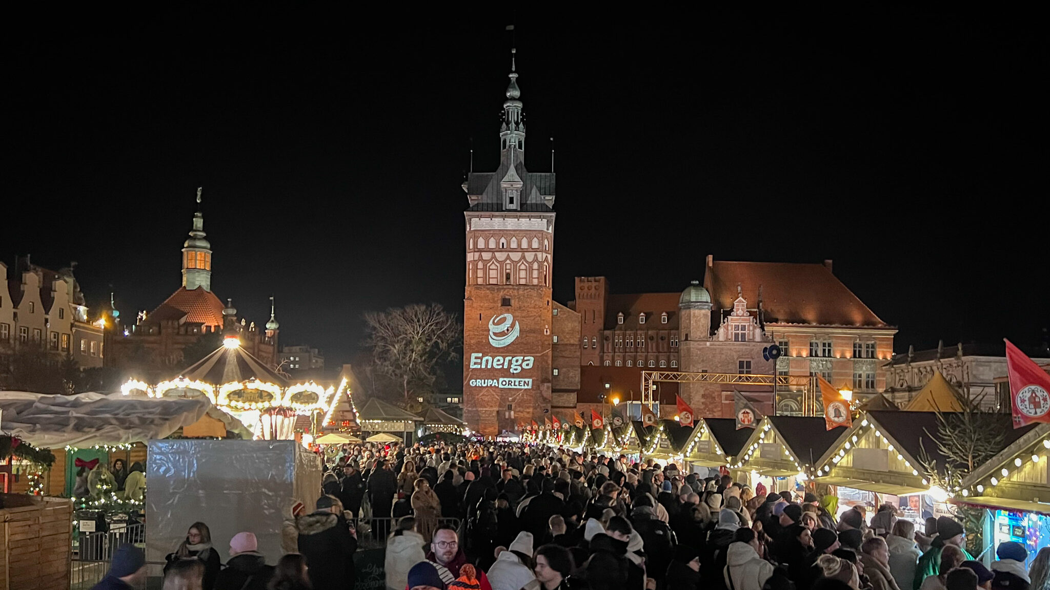 Evening view of the Gdansk Christmas Market lit up.