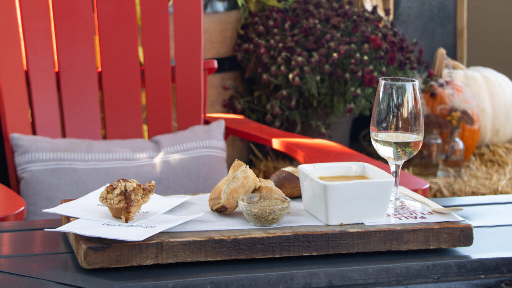 Wine and snacks served on outdoor patio.