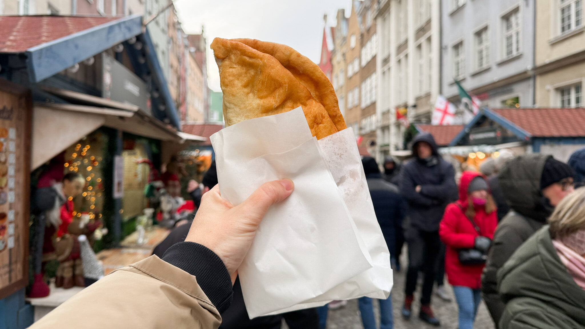 Hungarian Langos held up in Gdansk old town.