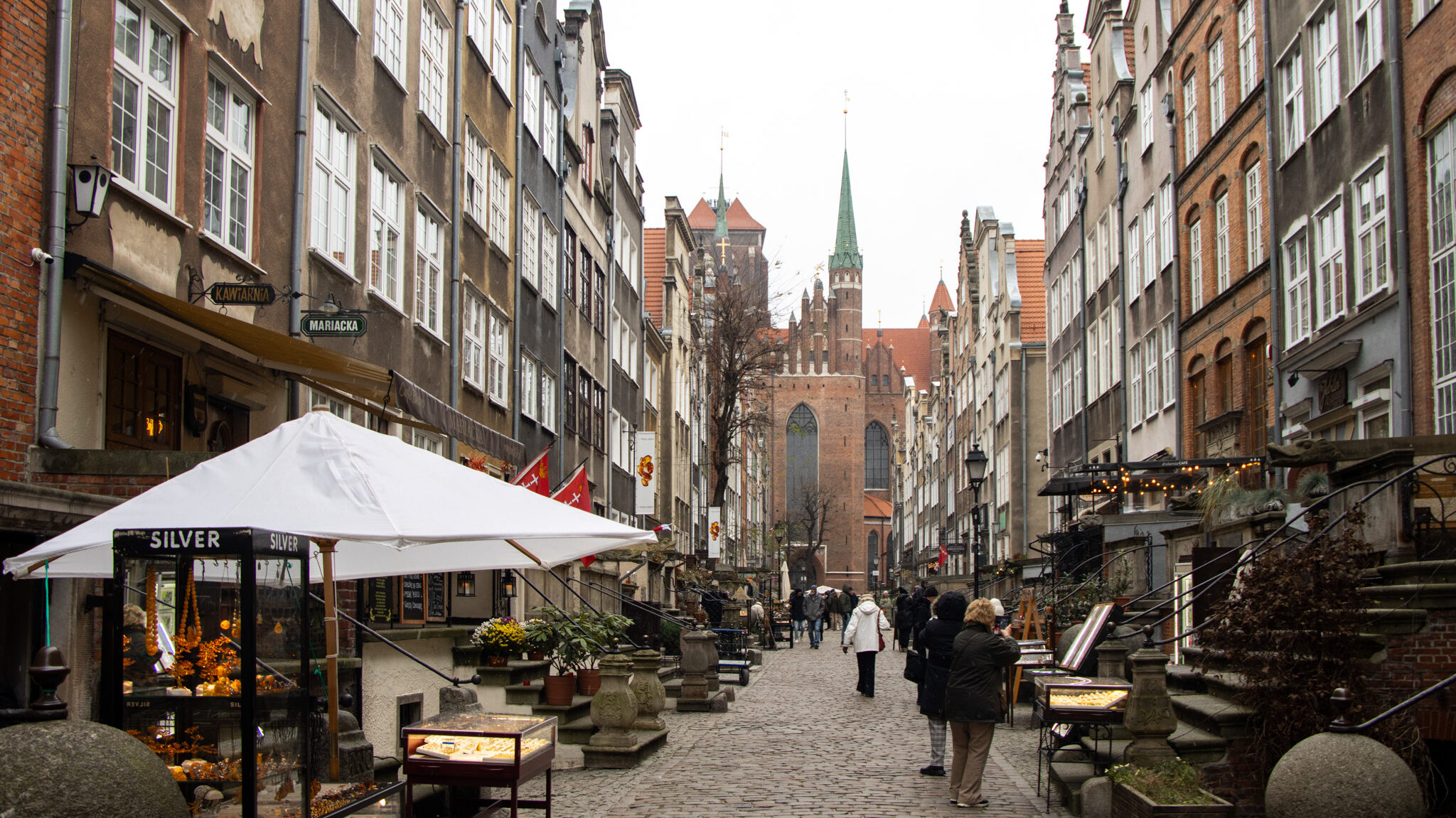 Old town street lined with shops selling amber.