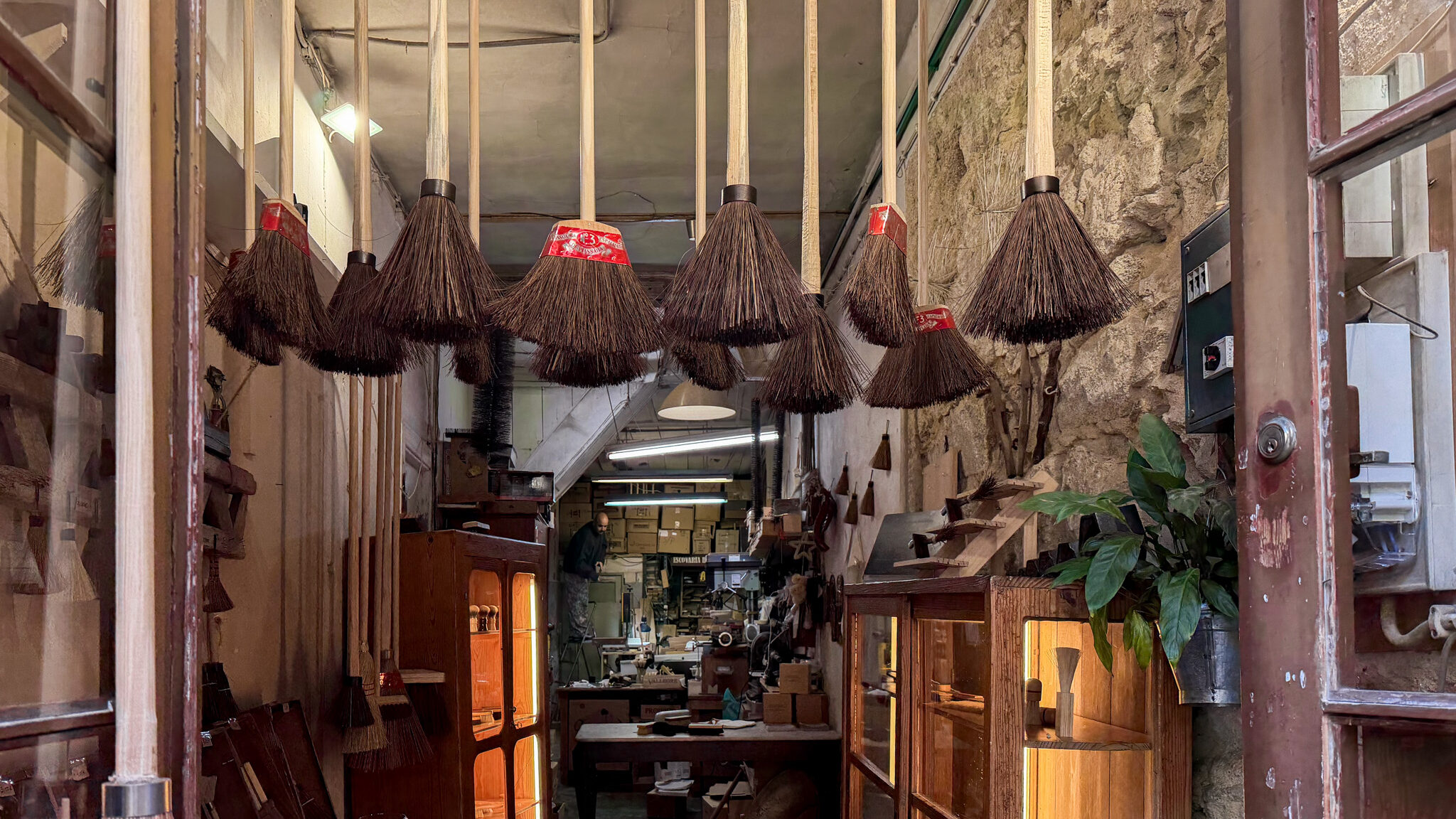 Small shop in Porto selling traditional brooms.