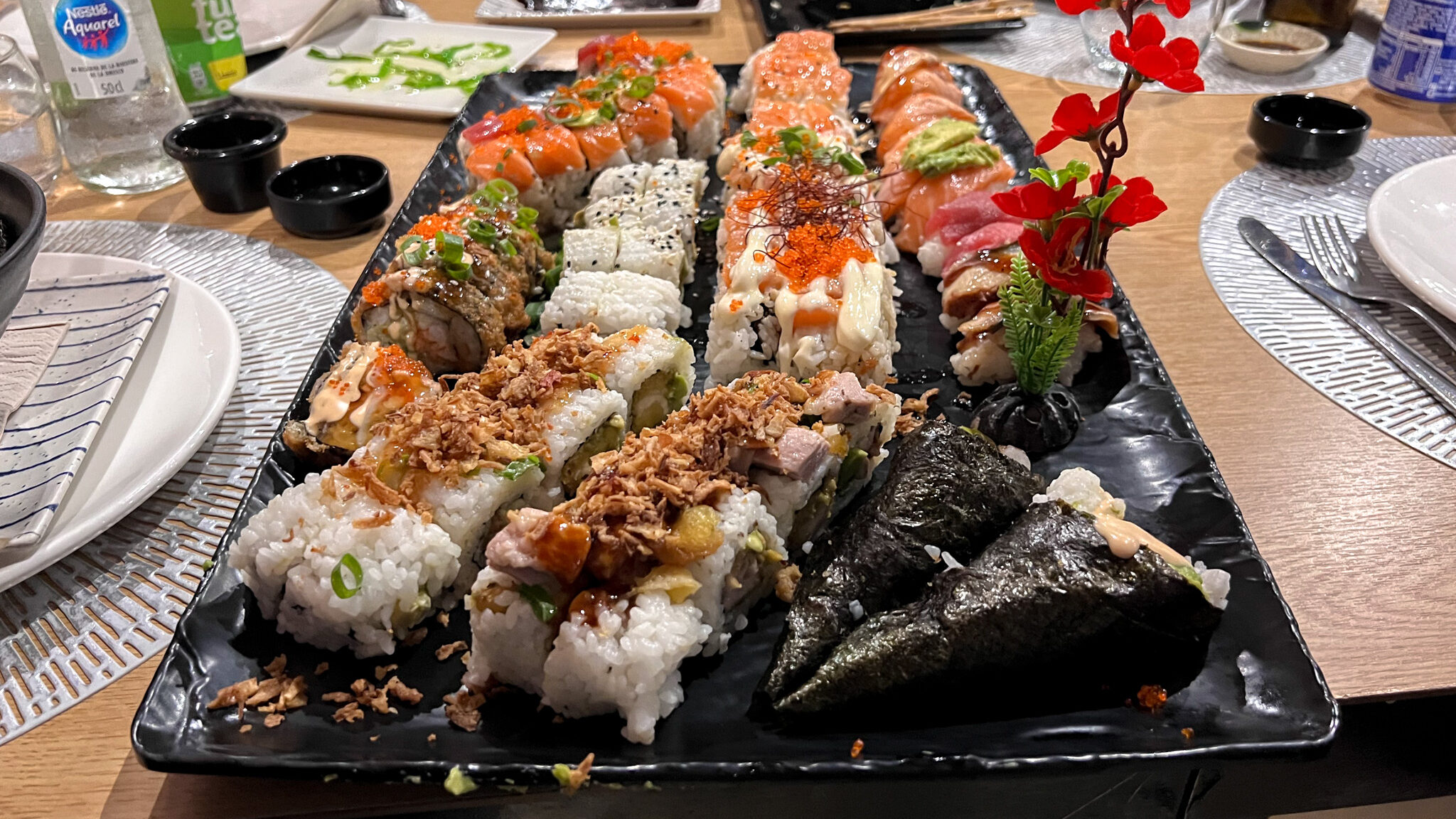 Kasumi Cartagena | Krista the Explorer Large plate of sushi with different toppings.