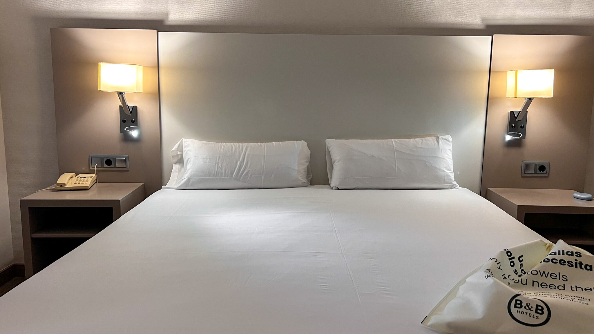 BB Hotel Cartagena | Krista the Explorer Large double bed with lights on wall.