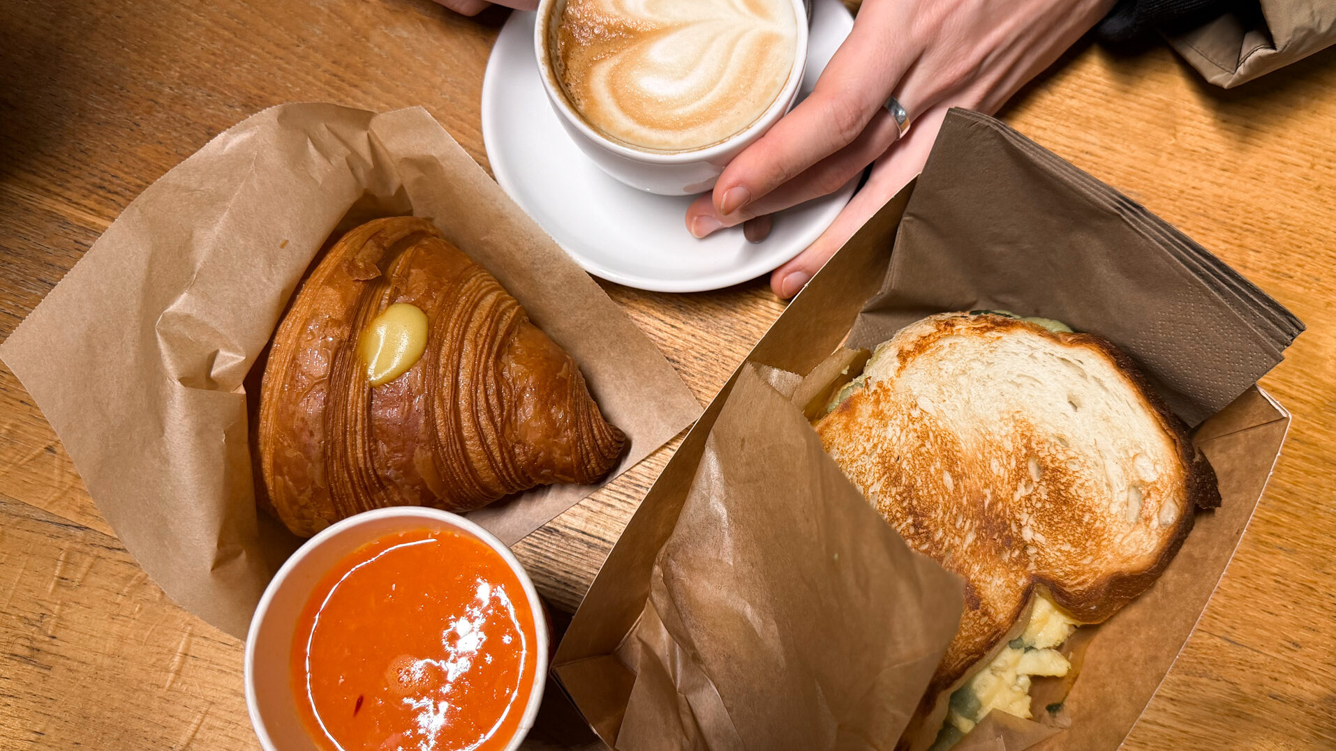 Breakfast at indoor market during one day in Milan.