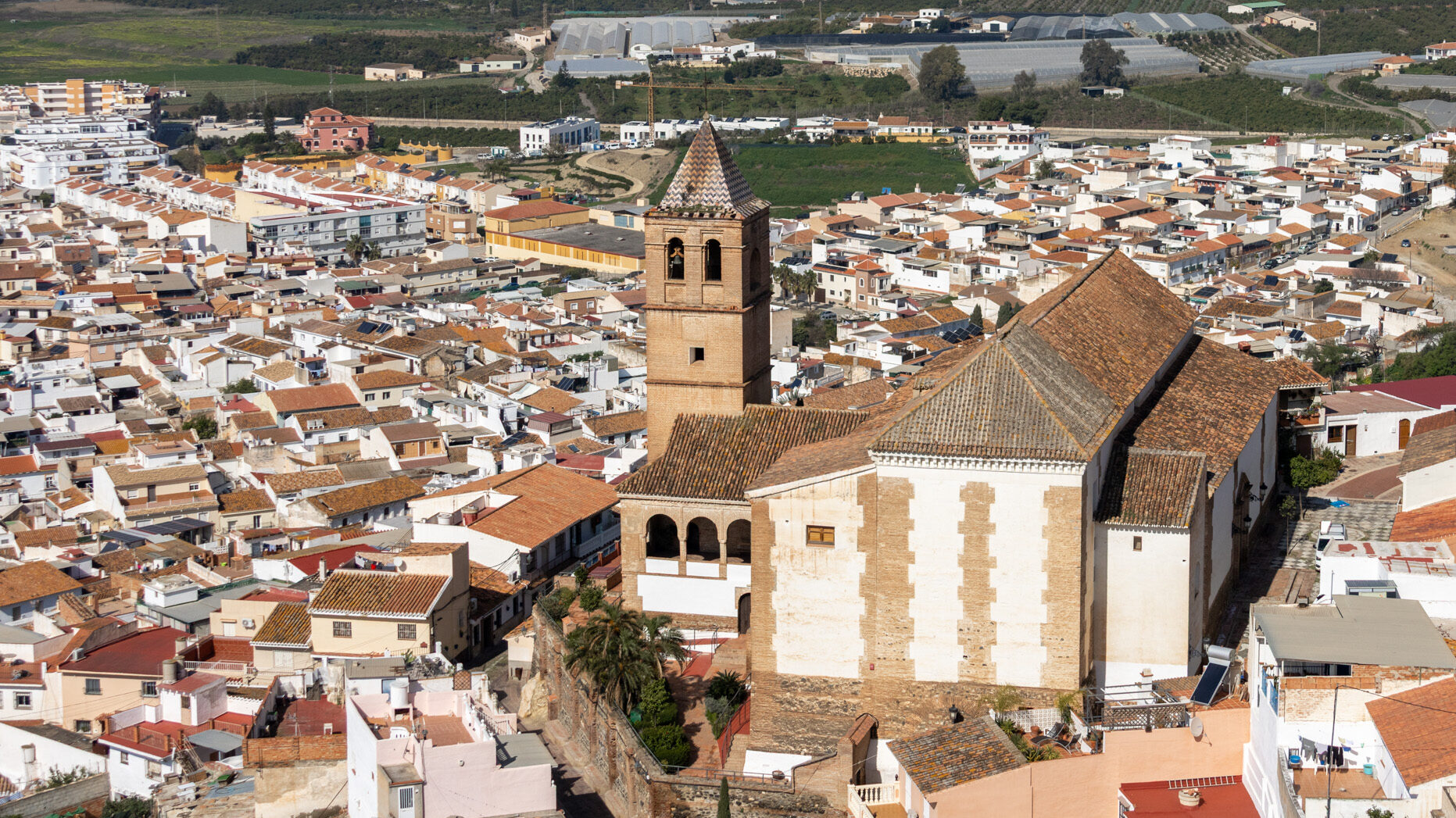 Santa Maria Velez Malaga | Krista the Explorer Aerial view of a historic church in the centre of old town.