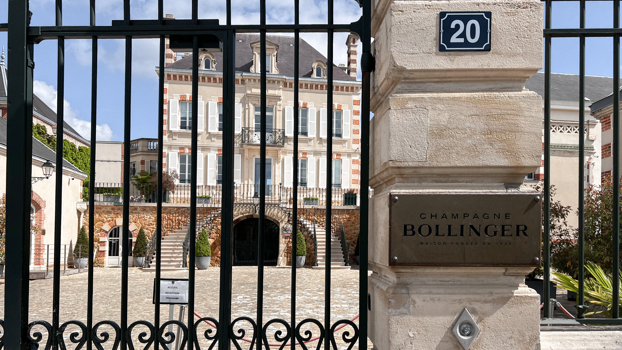 Closed gate at the entrance to champagne house.