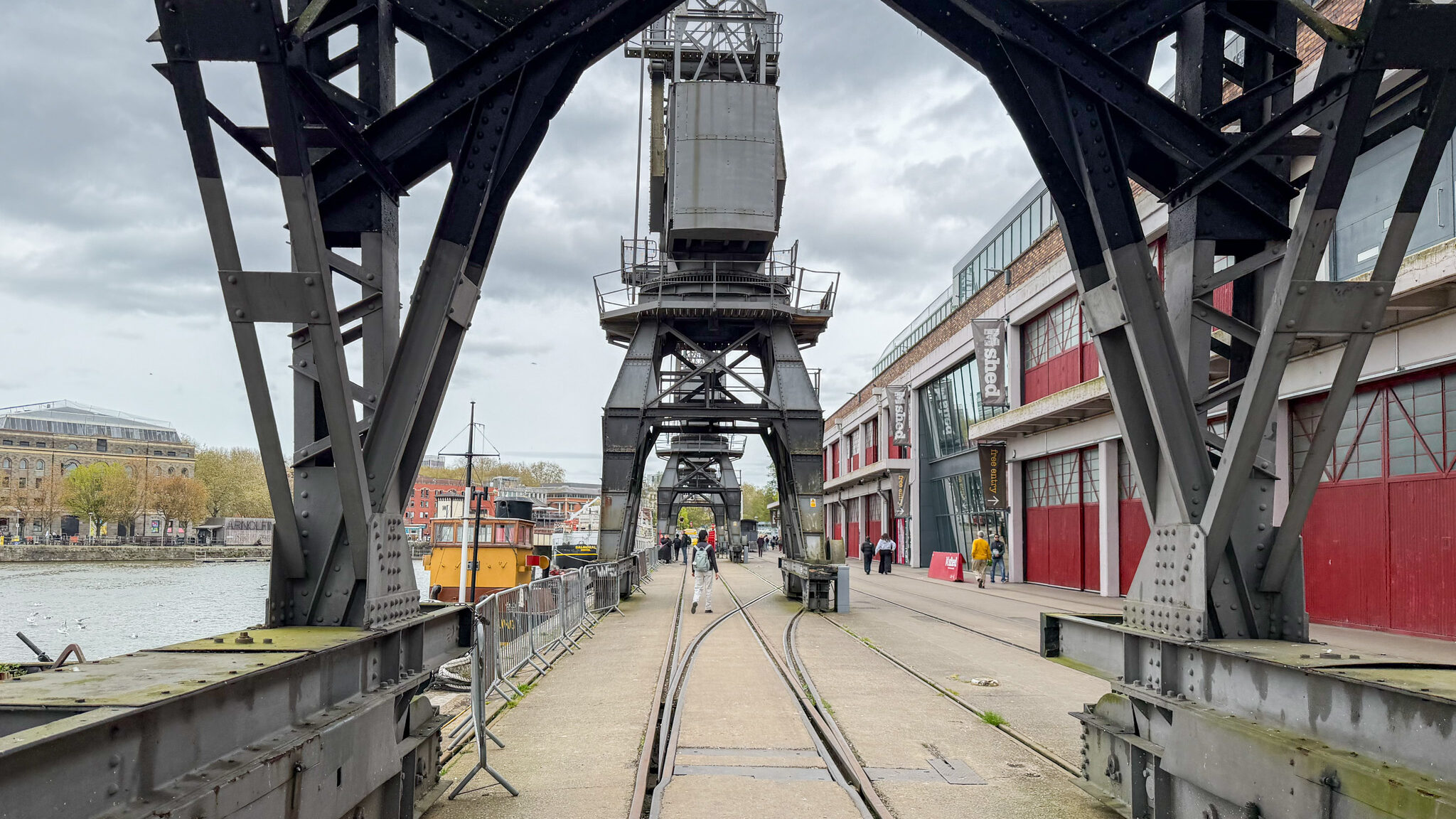 Heavy iron framework along waterfront in Bristol.