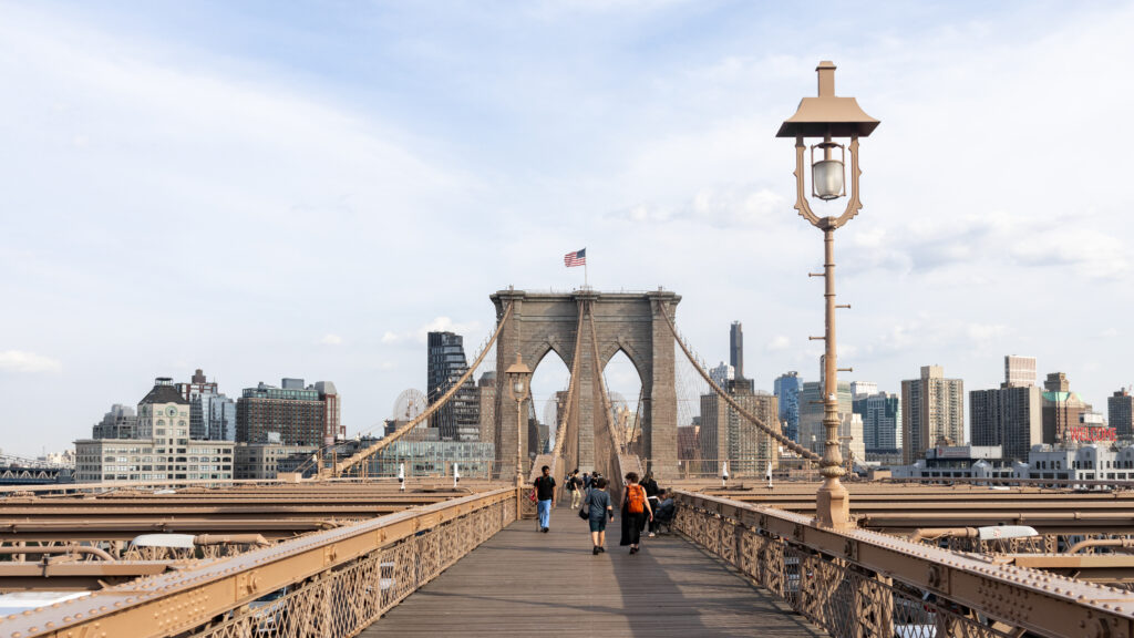 Brooklyn Bridge | Krista the Explorer People walking across Brooklyn Bridge one of the best things to do in Brooklyn.