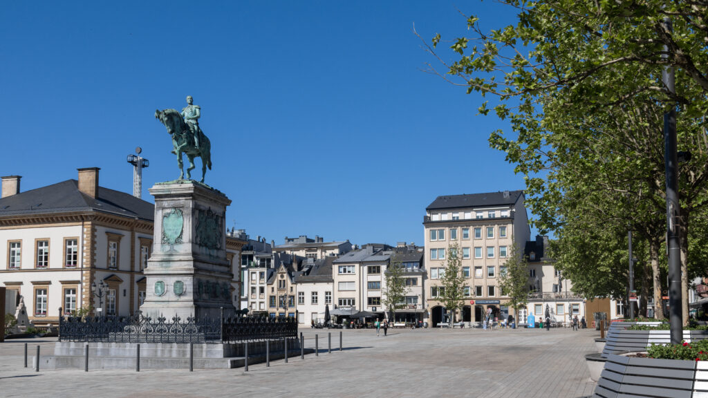 Place Guillaume II Luxembourg | Krista the Explorer Equestrian statue on a stone pedestal in a city square.