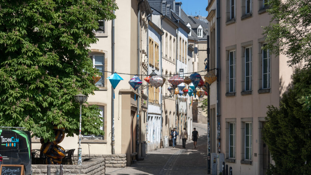 Ville Haute Luxembourg | Krista the Explorer Narrow cobblestone street in a European town.