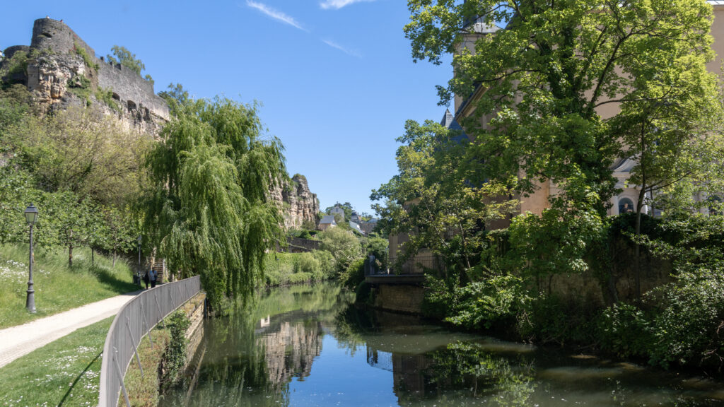 Alzette Luxembourg | Krista the Explorer Riverside park with an ancient stone fortress wall.