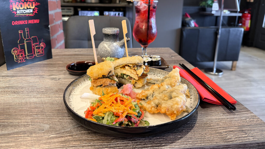 KoKu Kitchen Dunfermline | Krista the Explorer Sharing plate of assorted fried foods in Asian restaurant.