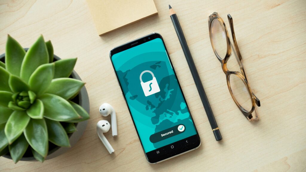 Mobile App | Krista the Explorer Phone screen shows a security app with a padlock over a globe.