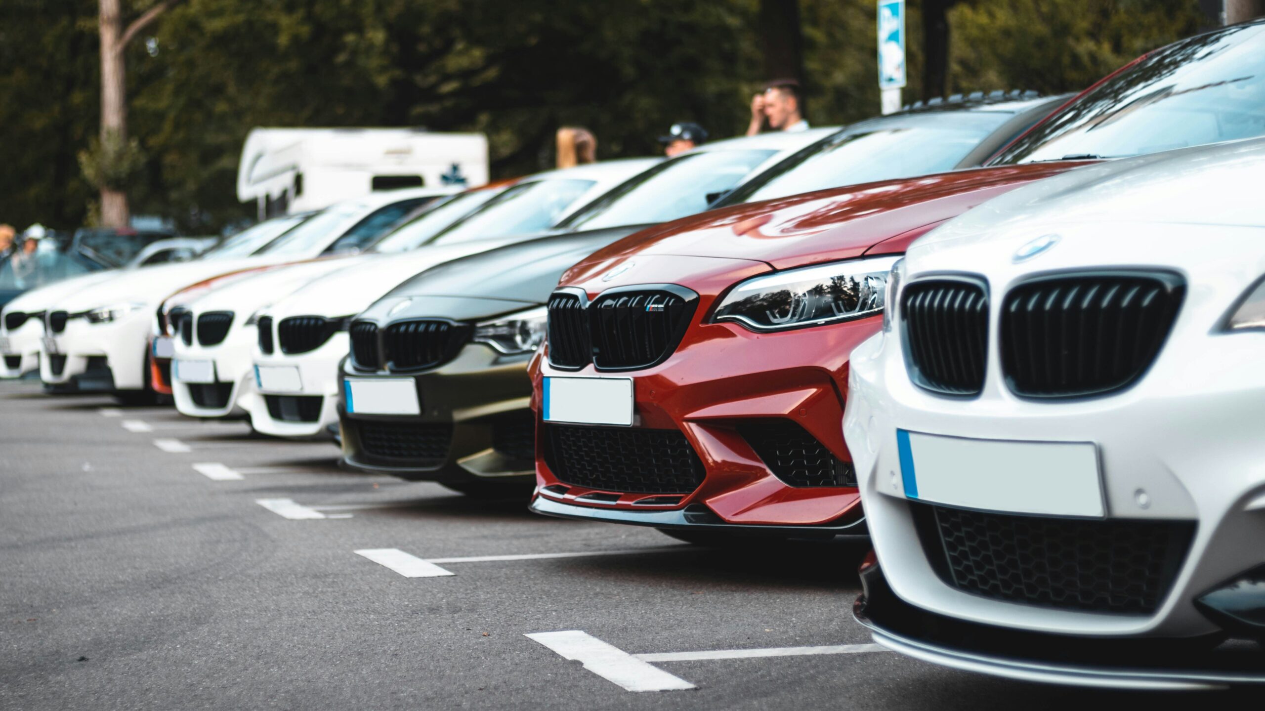 Row of cars lined up in parking lot in Houston.