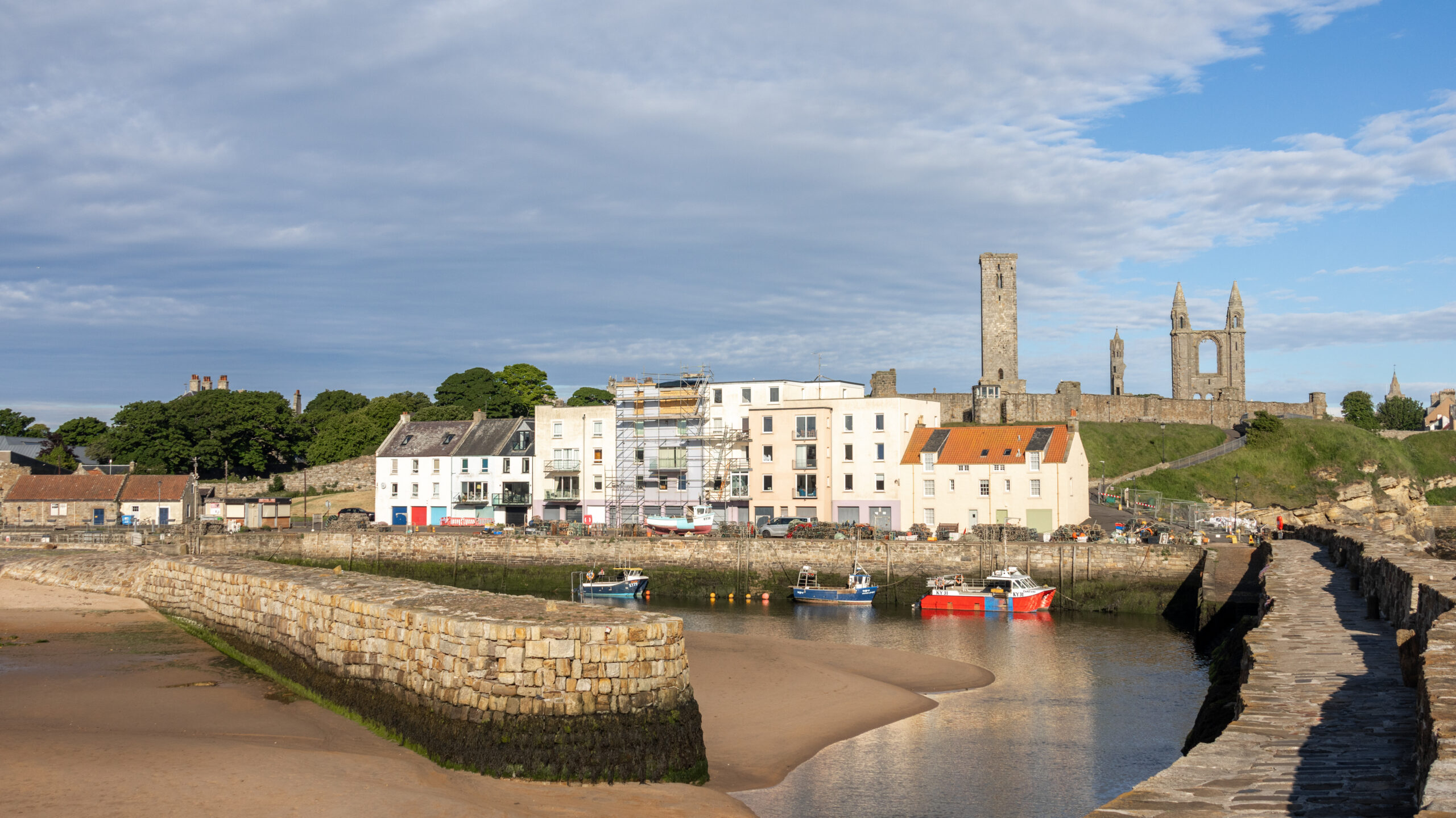 View of St Andrews pier and the town in the background at sunrise.