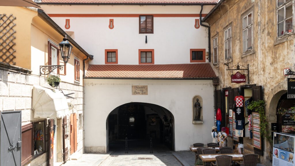 Stone Gate Zagreb | Krista the Explorer Cobblestone street going through white stone arch.