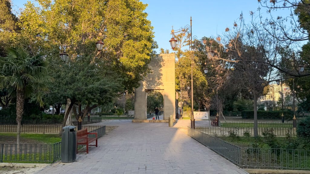 Paseo del Malecon Murcia | Krista the Explorer Shaded park with ancient stone arch on display.