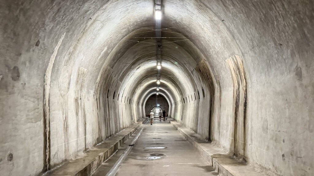 Gric Tunnels Zagreb | Krista the Explorer Concrete tunnels lit up leading through old town.