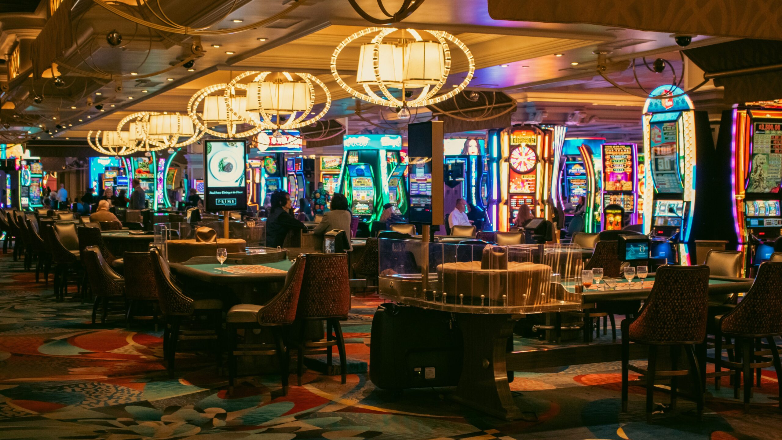 Casino floor in Las Vegas with colourful lighting.