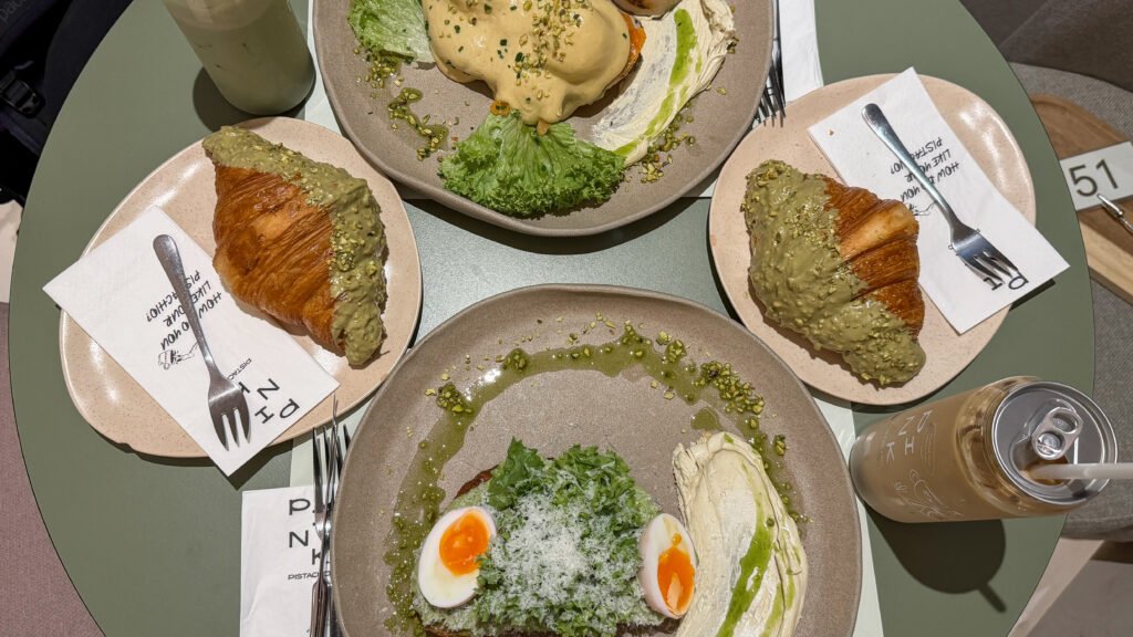 Pistachio covered croissants and other brunch dishes.