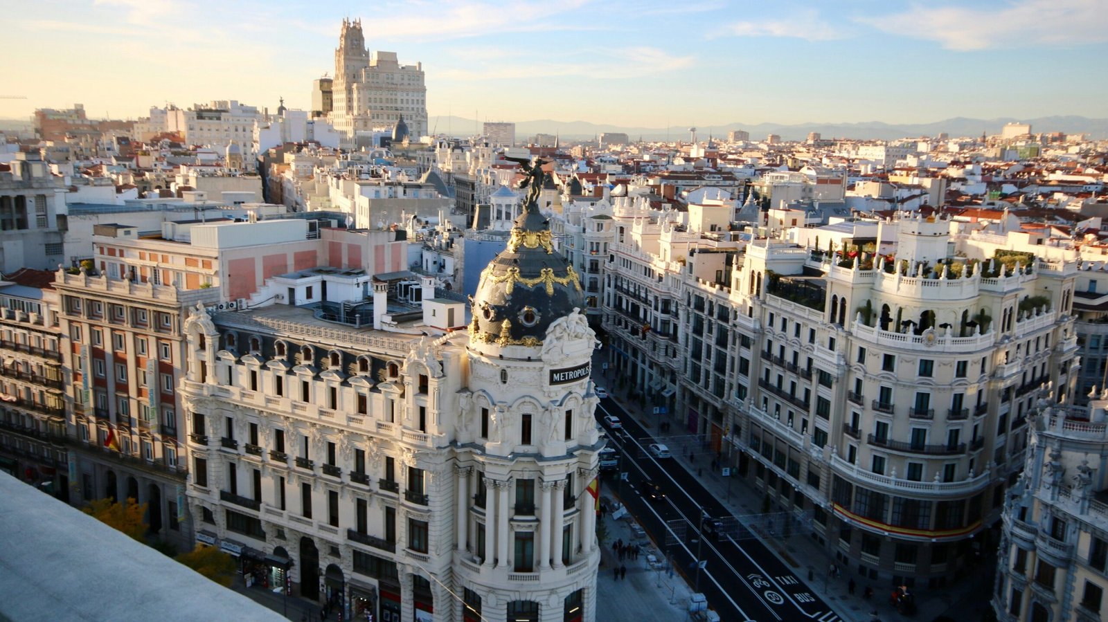 Madrid Casino | Krista the Explorer Panoramic cityscape of Madrid with the iconic Metropolis buildingâs ornate dome.