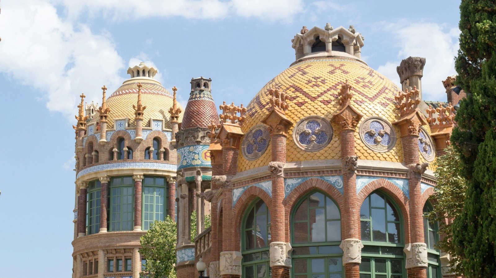 Barcelona Casino | Krista the Explorer | Krista the Explorer Ornate historic building with colourful tiled domes in Barcelona.