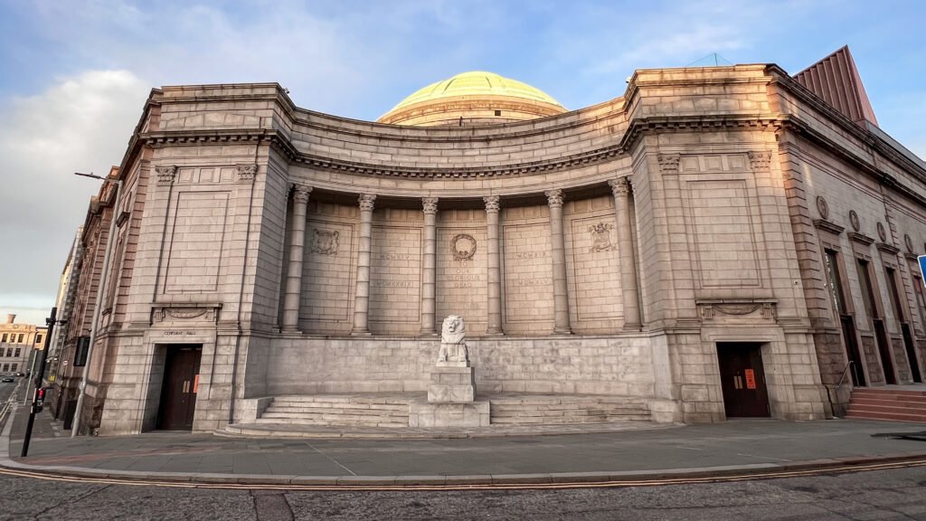 Aberdeen Tour | Krista the Explorer Beige stone neoclassical building with a central dome.