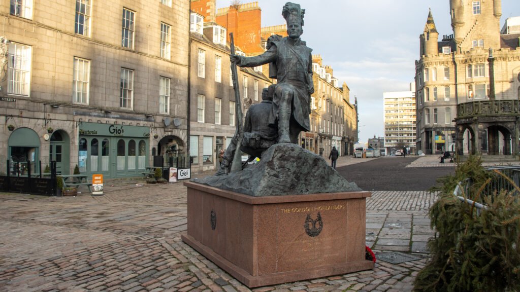 Gordon Highlanders Aberdeen | Krista the Explorer Bronze statue of a Highlander in military dress.