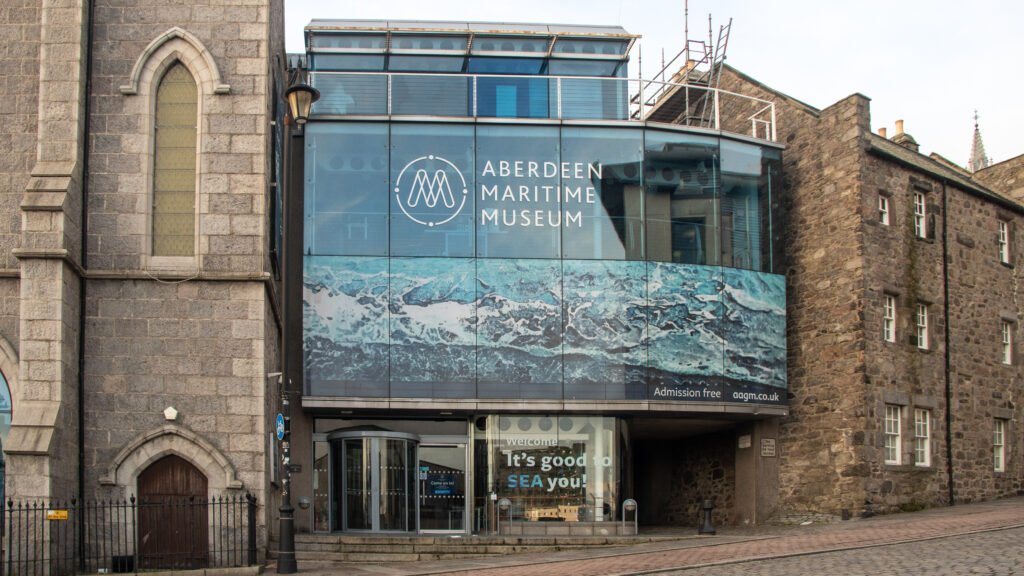 Museums Aberdeen | Krista the Explorer Front view of the Aberdeen Maritime Museum with a modern glass façade.
