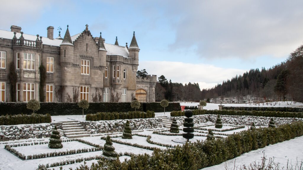 Balmoral Castle Aberdeen | Krista the Explorer Balmoral Castle gardens with snow covering grass.