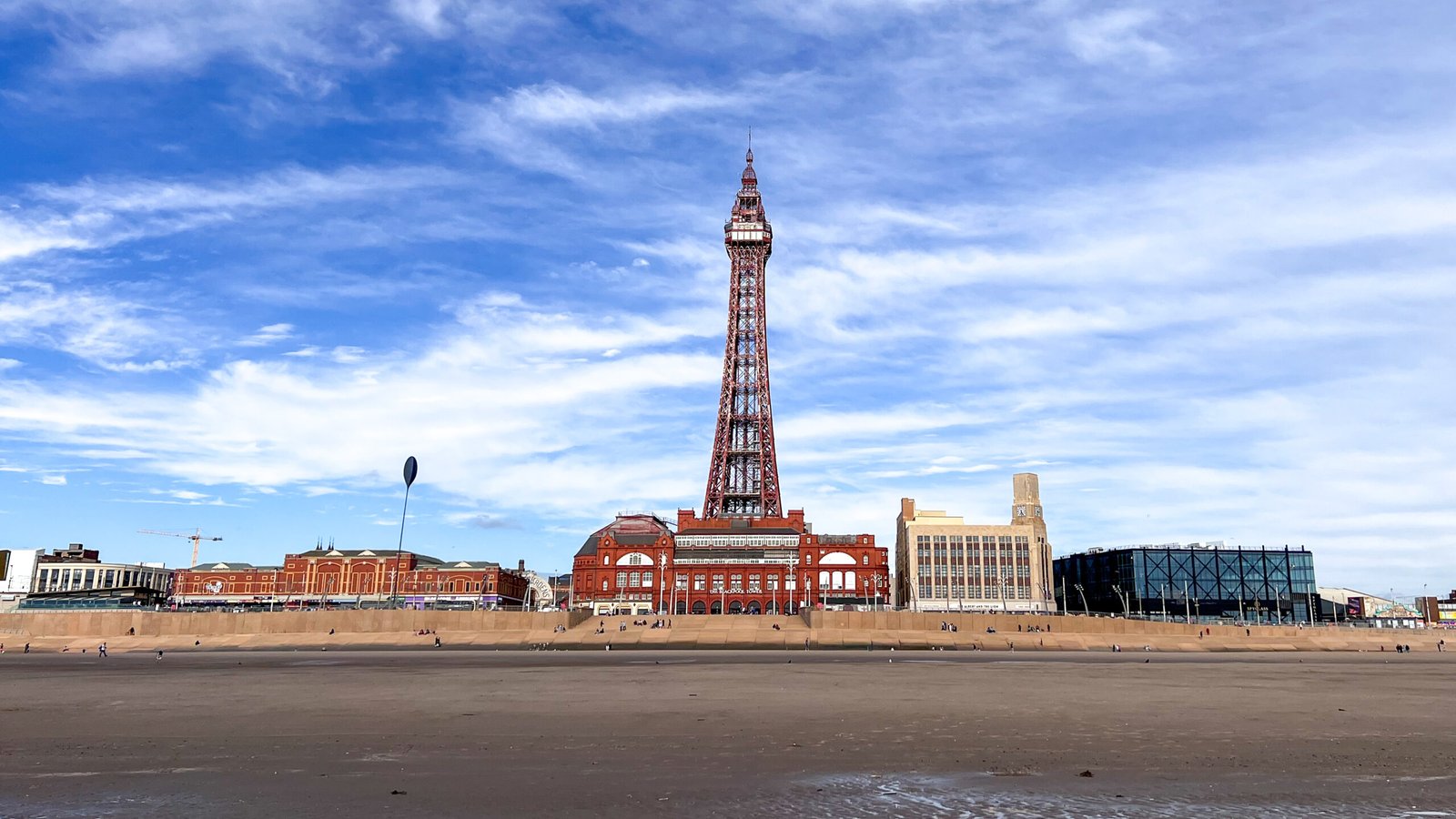 View of The Blackpool Tower from a distance on the beach.