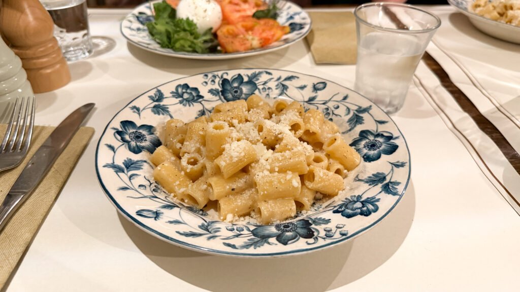 Vanda Rome | Krista the Explorer Plate of creamy parmesan penne pasta.